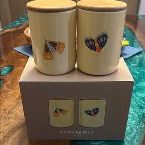 Culturefly yellow ceramic butterfly canisters 2 jars featuring wooden lids. NIB
